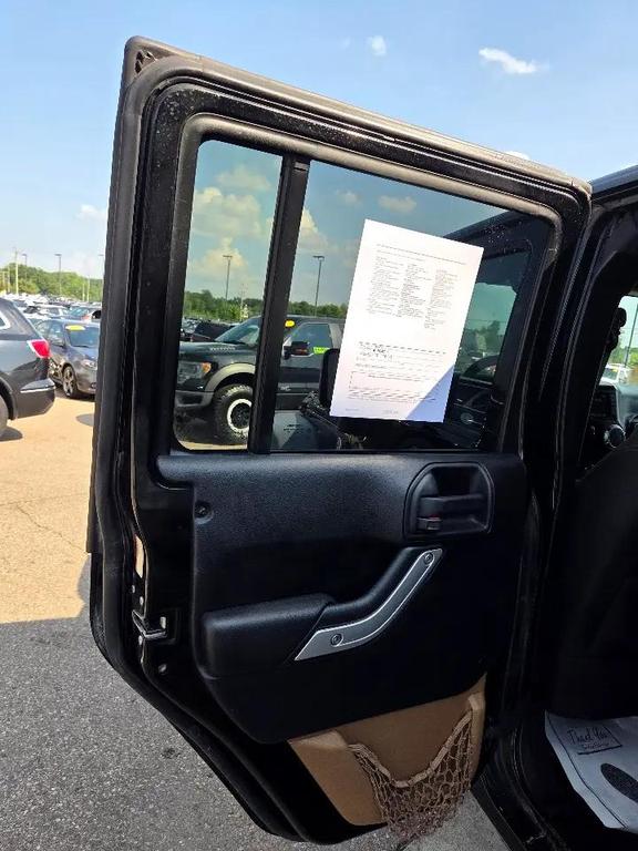 used 2014 Jeep Wrangler Unlimited car, priced at $12,995