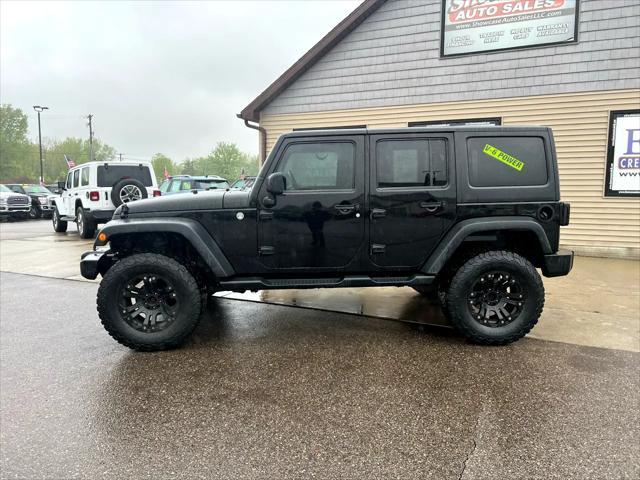 used 2011 Jeep Wrangler Unlimited car, priced at $11,995