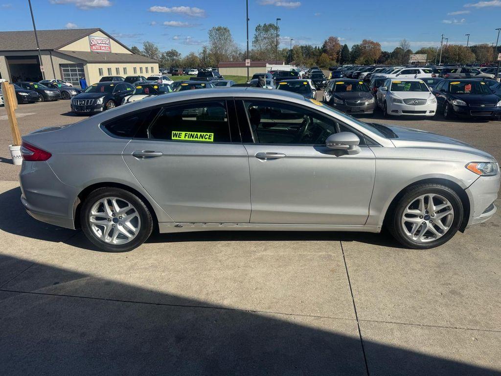 used 2014 Ford Fusion car, priced at $4,495