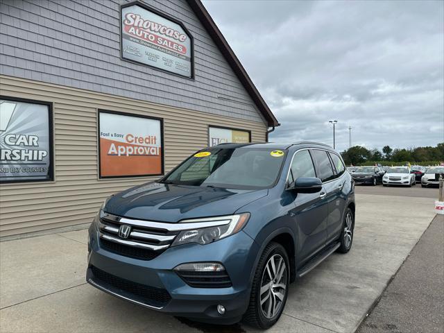 used 2016 Honda Pilot car, priced at $16,995