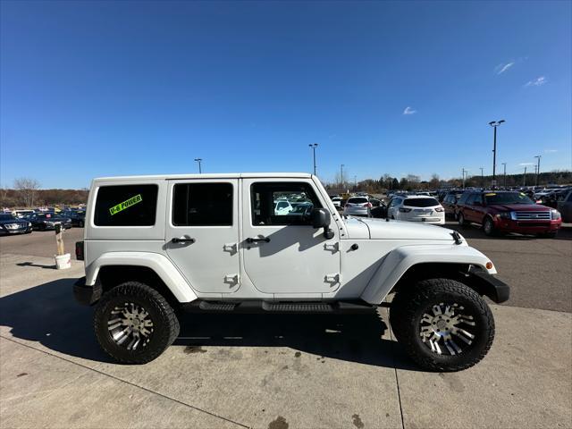 used 2011 Jeep Wrangler Unlimited car, priced at $13,995