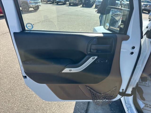 used 2011 Jeep Wrangler Unlimited car, priced at $13,995