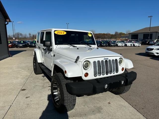 used 2011 Jeep Wrangler Unlimited car, priced at $13,995