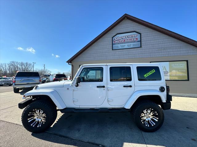 used 2011 Jeep Wrangler Unlimited car, priced at $13,995