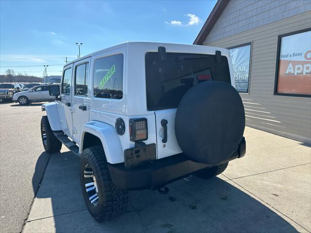 used 2011 Jeep Wrangler Unlimited car, priced at $13,995