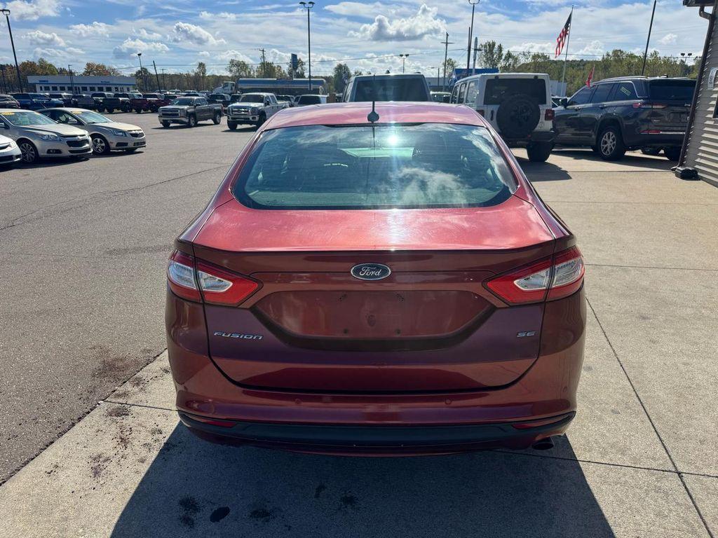 used 2014 Ford Fusion car, priced at $3,795