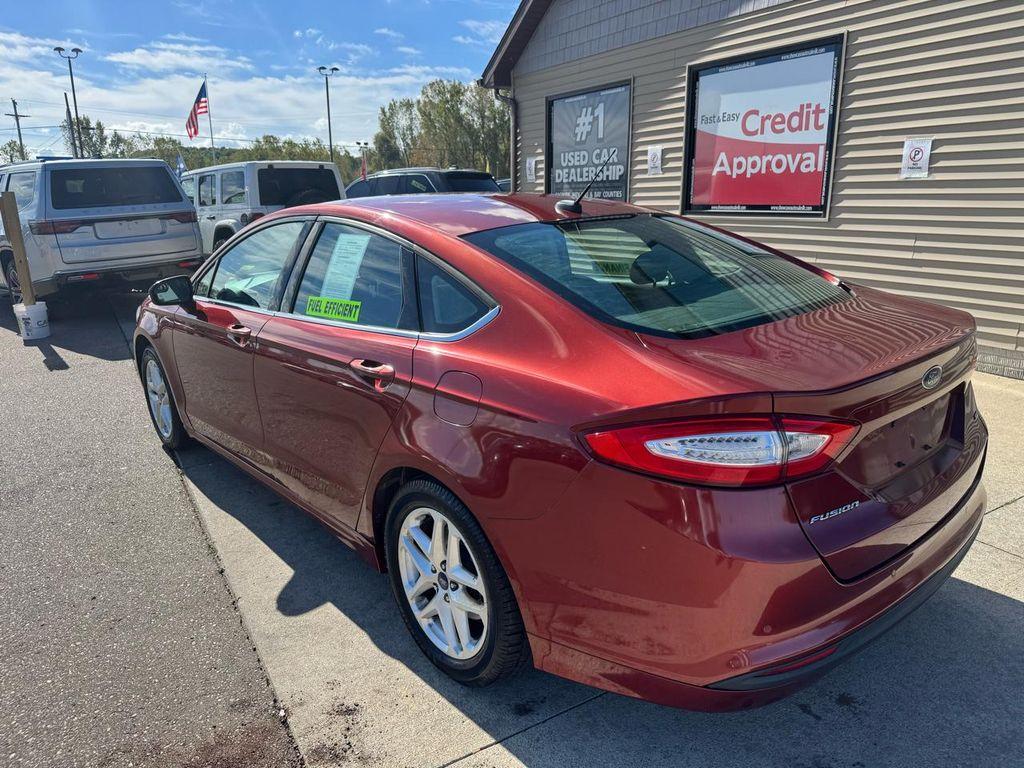 used 2014 Ford Fusion car, priced at $3,795