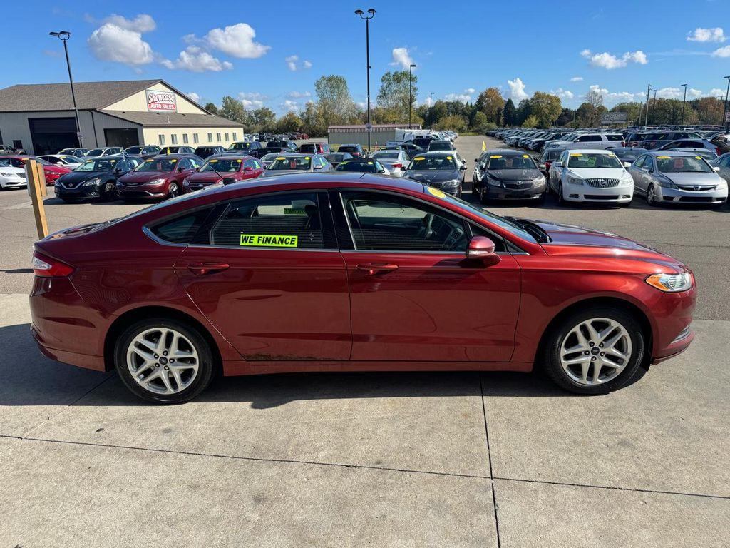 used 2014 Ford Fusion car, priced at $3,795