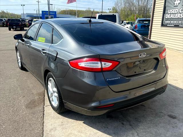 used 2015 Ford Fusion car, priced at $6,995