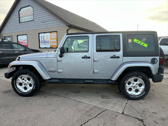 used 2013 Jeep Wrangler Unlimited car, priced at $11,995