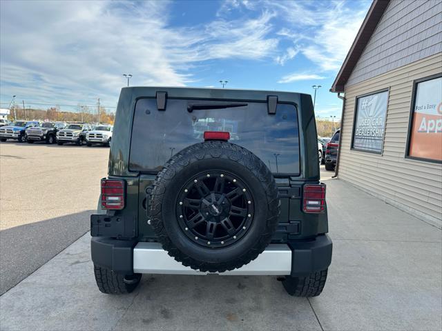 used 2011 Jeep Wrangler Unlimited car, priced at $11,995