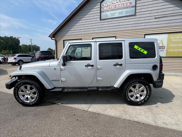 used 2012 Jeep Wrangler Unlimited car, priced at $11,995