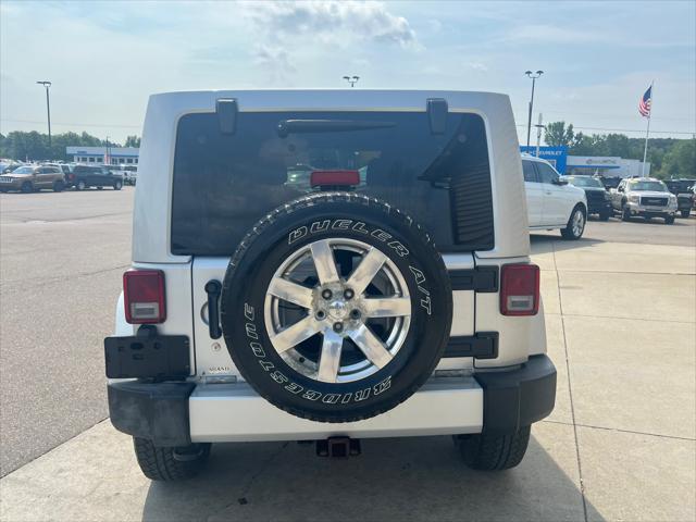 used 2012 Jeep Wrangler Unlimited car, priced at $11,995