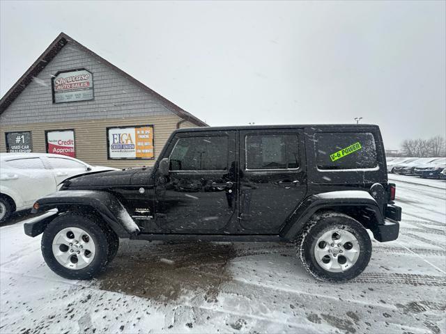 used 2014 Jeep Wrangler Unlimited car, priced at $12,995