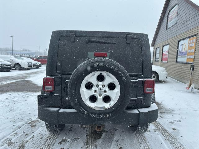 used 2014 Jeep Wrangler Unlimited car, priced at $12,995