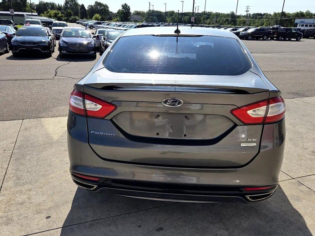 used 2014 Ford Fusion car, priced at $5,995