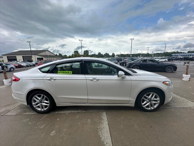 used 2014 Ford Fusion car, priced at $4,995