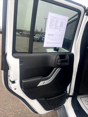 used 2015 Jeep Wrangler Unlimited car, priced at $12,995