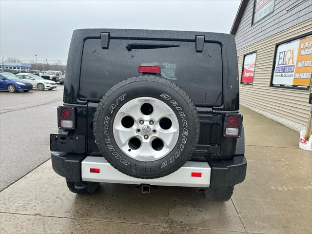 used 2013 Jeep Wrangler Unlimited car, priced at $16,995