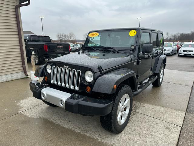 used 2013 Jeep Wrangler Unlimited car, priced at $16,995