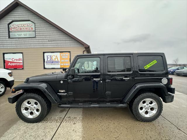 used 2013 Jeep Wrangler Unlimited car, priced at $16,995