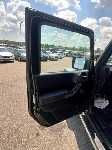 used 2011 Jeep Wrangler Unlimited car, priced at $7,995