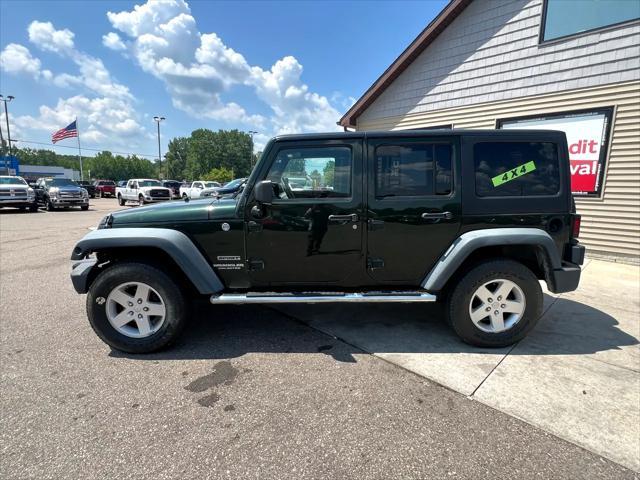used 2011 Jeep Wrangler Unlimited car, priced at $7,995