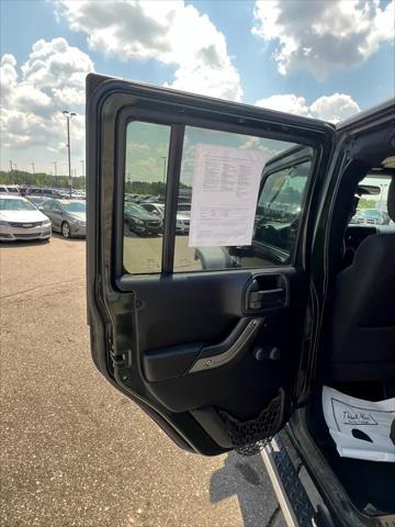 used 2011 Jeep Wrangler Unlimited car, priced at $7,995
