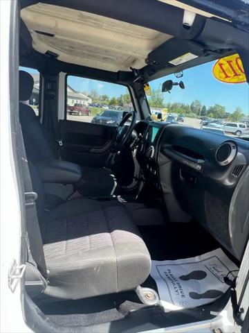 used 2011 Jeep Wrangler Unlimited car, priced at $10,995