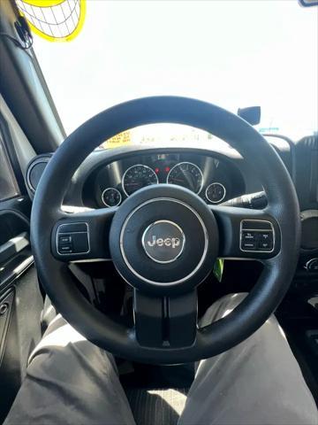 used 2011 Jeep Wrangler Unlimited car, priced at $10,995