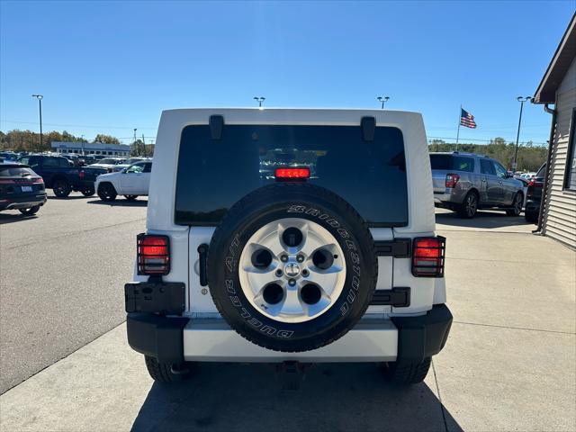 used 2012 Jeep Wrangler Unlimited car, priced at $13,995