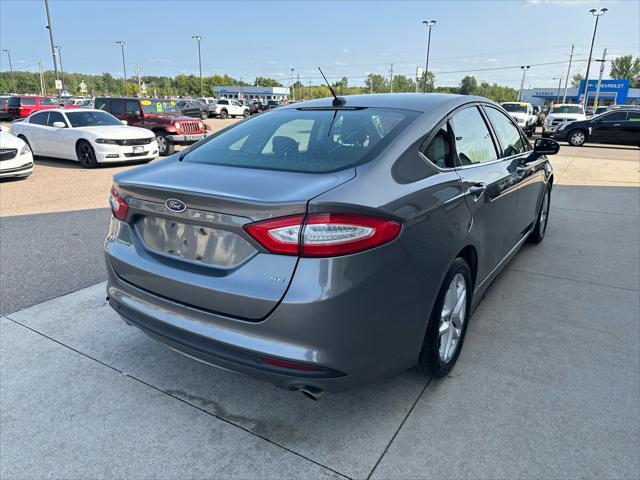 used 2014 Ford Fusion car, priced at $4,995