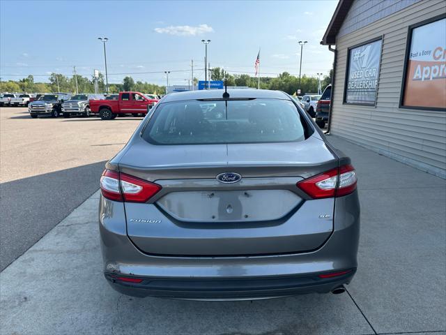 used 2014 Ford Fusion car, priced at $4,995