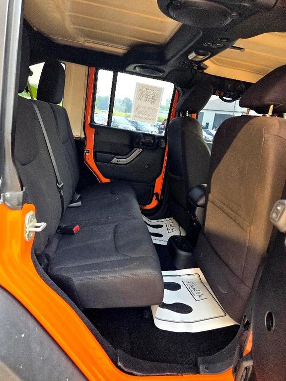used 2013 Jeep Wrangler Unlimited car, priced at $13,995