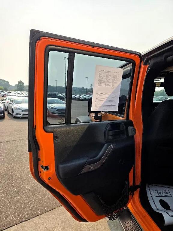 used 2013 Jeep Wrangler Unlimited car, priced at $13,995