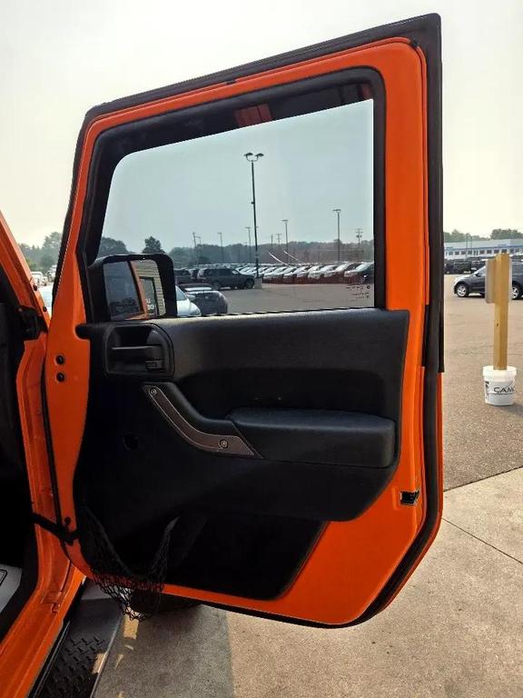 used 2013 Jeep Wrangler Unlimited car, priced at $13,995