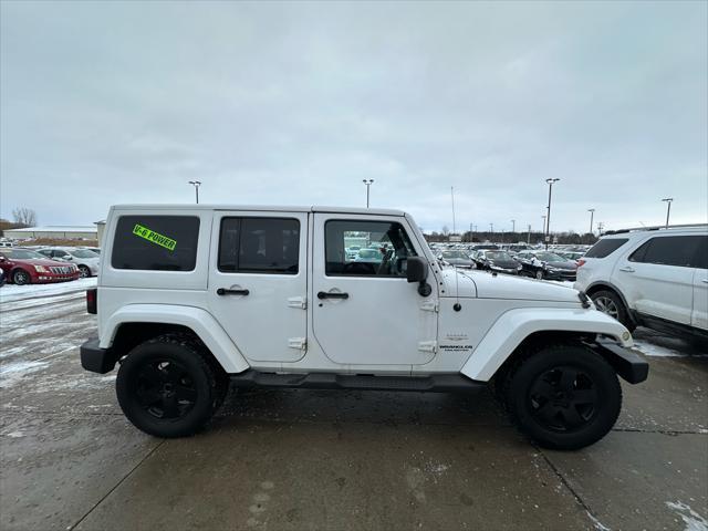 used 2011 Jeep Wrangler Unlimited car, priced at $9,995