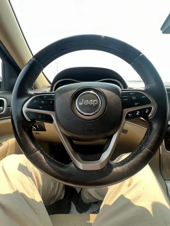 used 2014 Jeep Grand Cherokee car, priced at $7,995