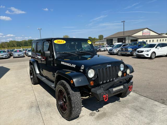 used 2013 Jeep Wrangler Unlimited car, priced at $12,995