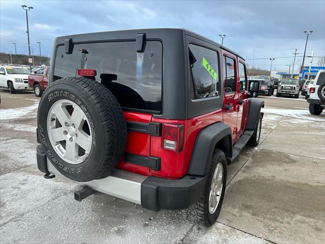 used 2011 Jeep Wrangler Unlimited car, priced at $9,995