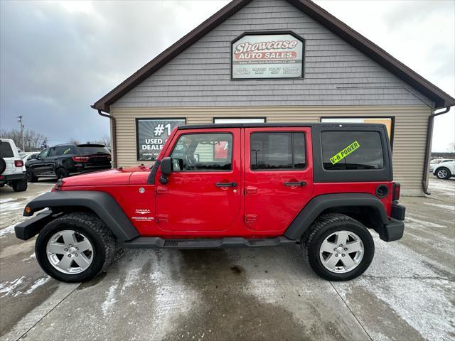 used 2011 Jeep Wrangler Unlimited car, priced at $9,995