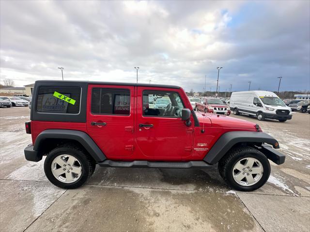 used 2011 Jeep Wrangler Unlimited car, priced at $9,995