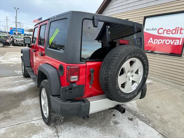 used 2011 Jeep Wrangler Unlimited car, priced at $9,995