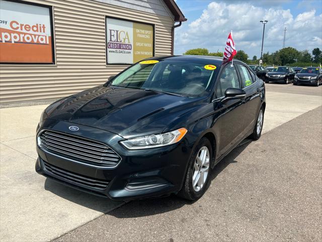 used 2014 Ford Fusion car, priced at $4,995