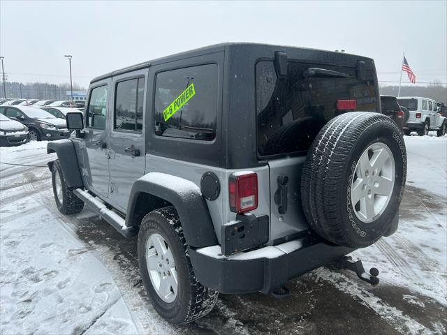 used 2014 Jeep Wrangler Unlimited car, priced at $9,995