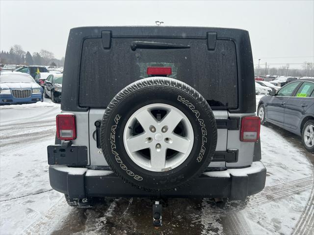 used 2014 Jeep Wrangler Unlimited car, priced at $9,995