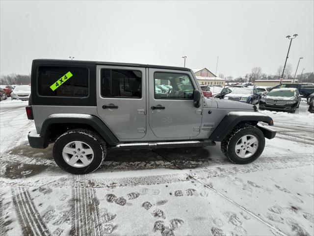 used 2014 Jeep Wrangler Unlimited car, priced at $9,995