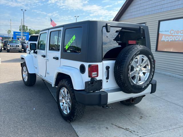 used 2013 Jeep Wrangler Unlimited car, priced at $18,995