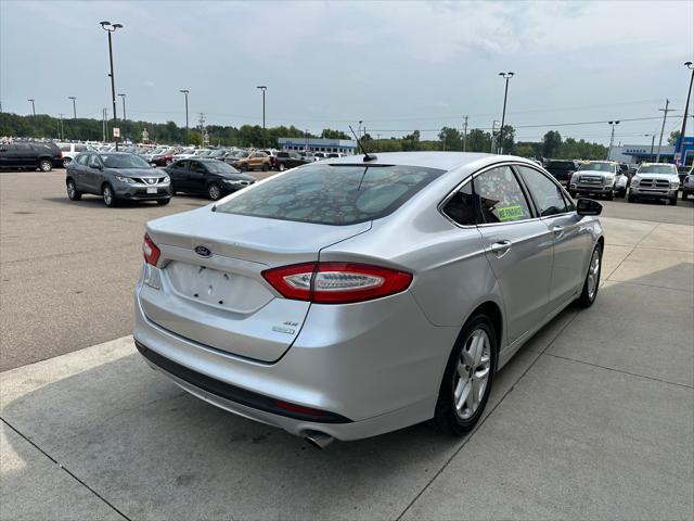 used 2016 Ford Fusion car, priced at $6,995