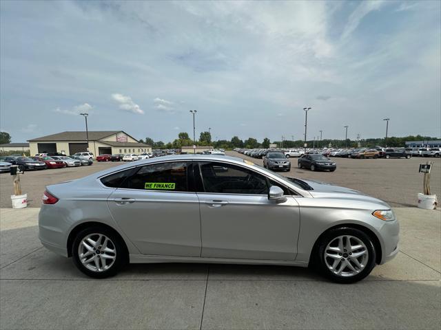 used 2016 Ford Fusion car, priced at $6,995